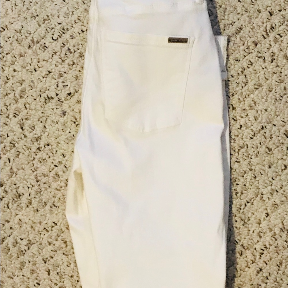 White skinny jeans wore once size 0